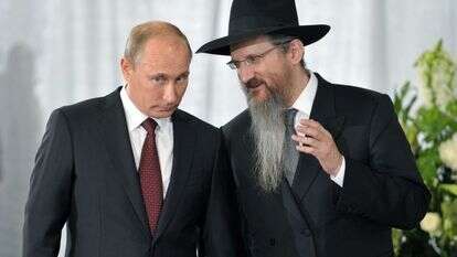פוטין והרב לזר. | EPA פוטין והרב לזר. | EPA