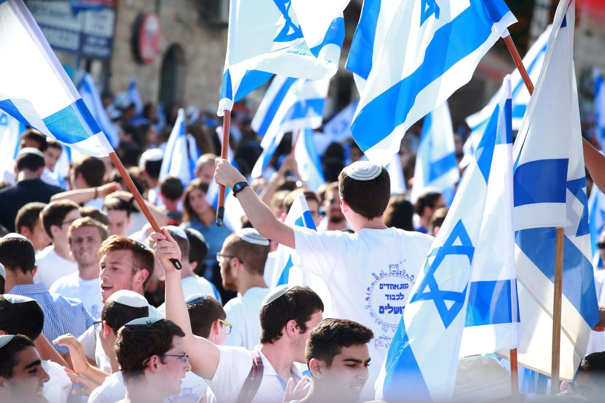 ישראלים בצעדה לכבוד איחוד ירושלים. | מרים צחי