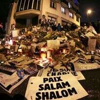 פינת זיכרון לזכר נרצחי פיגוע בצרפת. | AFP