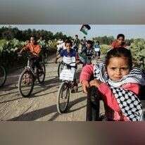 ילדים פלסטינים מתכוננים לצעדת השיבה. | AFP