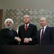 ולדימיר פוטין, ארדואן וחסן רוחאני. | EPA