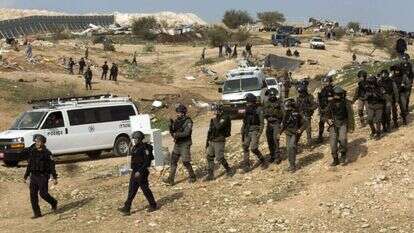 פעילות משותפת של כוחות משטרה וצבא. | EPA פעילות משותפת של כוחות משטרה וצבא. | EPA