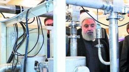 נשיא איראן חסן רוחאני בתערוכה גרעינית בטהרן. | EPA