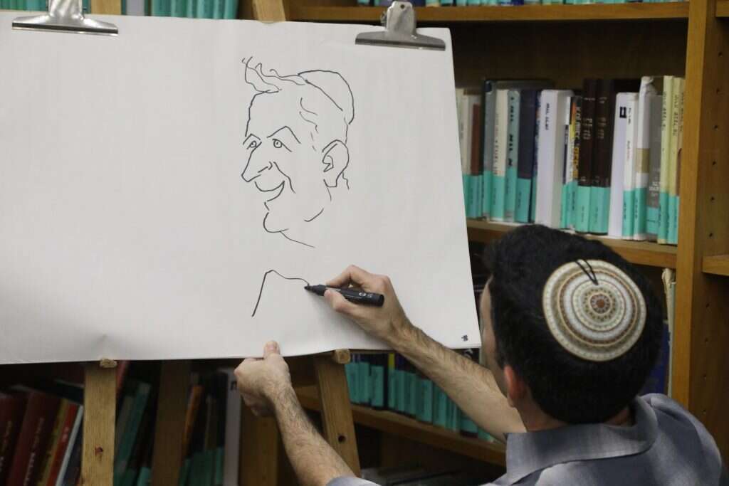 מציירים את דיוקנו של ש"י עגנון בכנסת. | דוברות הכנסת – יצחק הררי