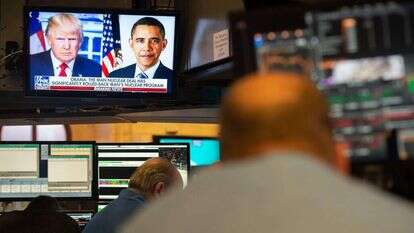 ברק אובמה ודונלד טראמפ. | AFP