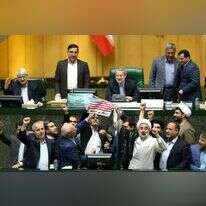 חברי הפרלמנט האיראני מציתים את דגל ארה''ב, ארכיון. | EPA