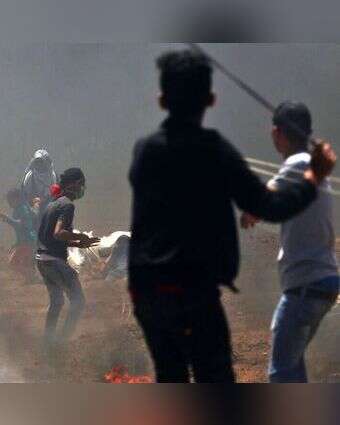 ילדים בהפגנות מול גדר הגבול עם עזה. | AFP