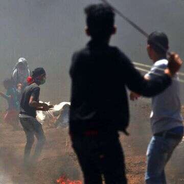 ילדים בהפגנות מול גדר הגבול עם עזה. | AFP