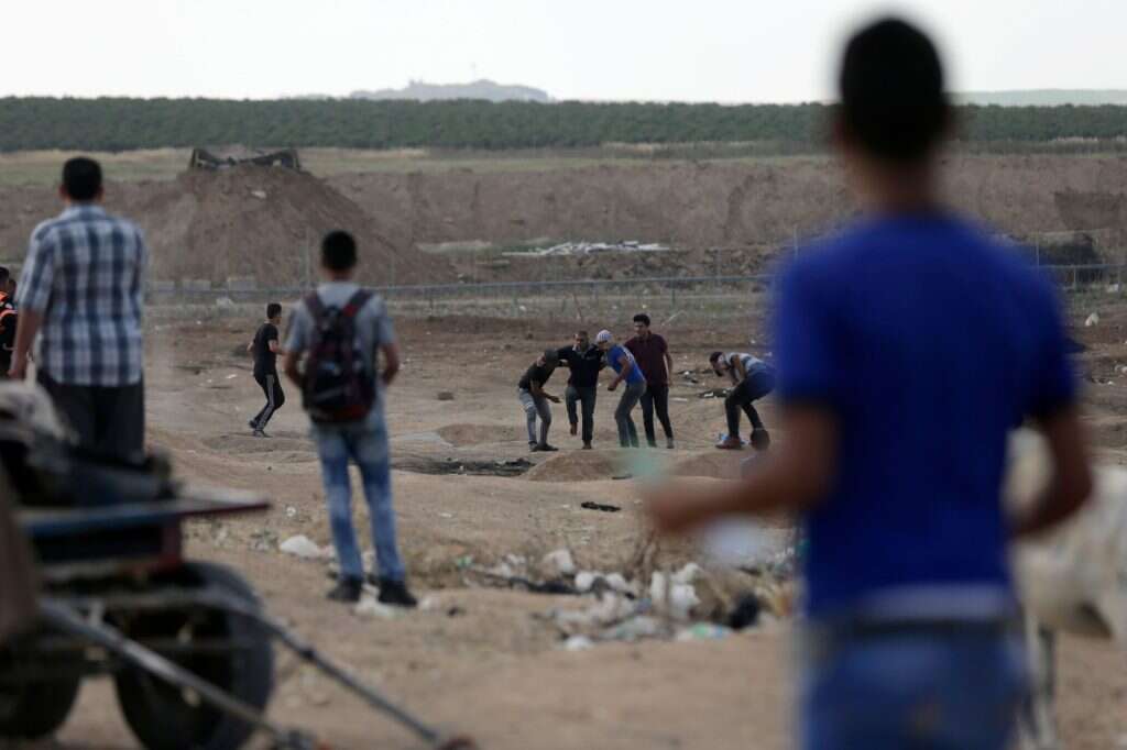 ילדים בהפגנות על גדר הגבול עם עזה. | AFP