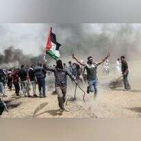 פלסטינים מפגינים בגבול רצועת עזה. | AFP