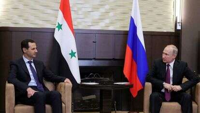 ולדימיר פוטין ובשאר אל אסד. | EPA