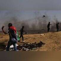 מחבלי חמאס תוקפים את גדר הרצועה, ארכיון | גטי אימג'ס