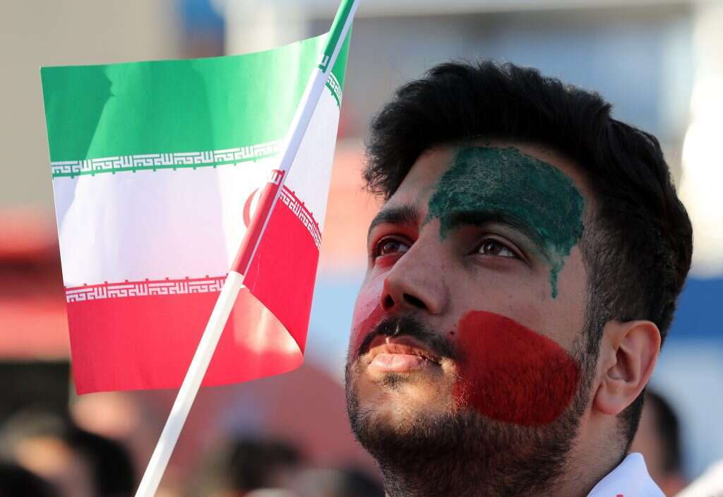 אוהד איראני במשחק הנבחרת בין איראן ומרוקו. הנבחרת של הרפובליקה האסלאמית ניצחה ממש בדקה האחרונה את יריבתה מצפון אפריקה. | EPA