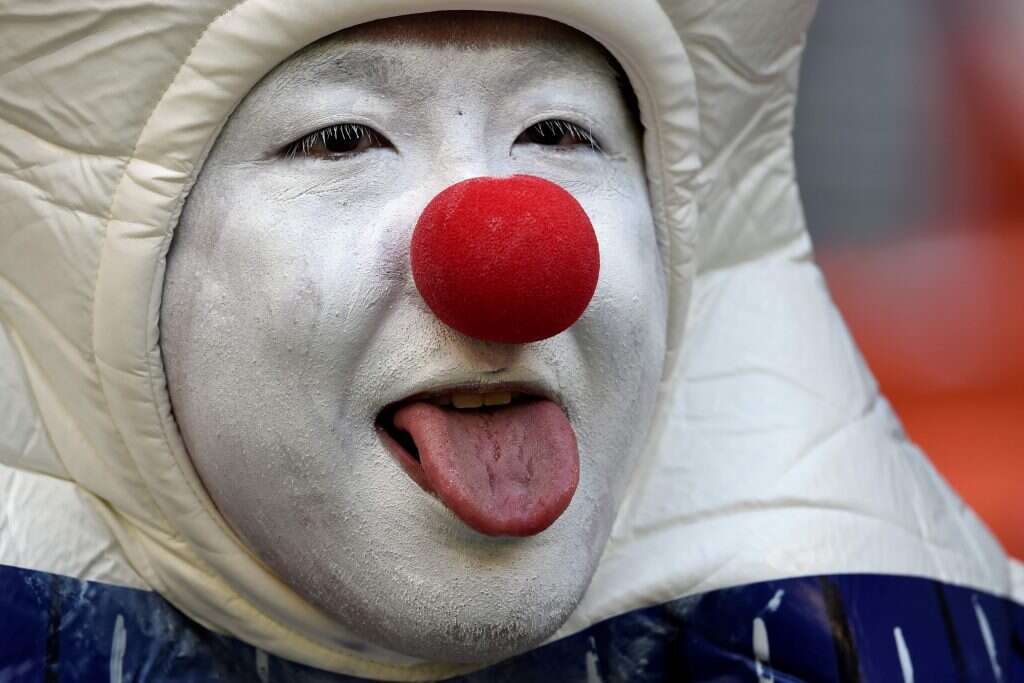 אוהד נבחרת יפן. | AFP אוהד נבחרת יפן. | AFP