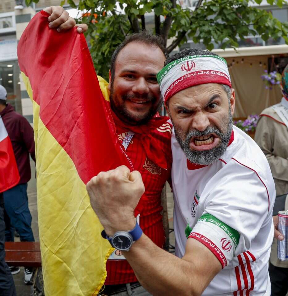 אוהד איראני ואוהד ספרדי. | EPA
