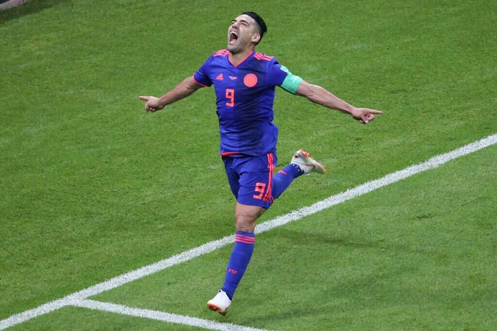 קפטן נבחרת קולומביה, רדמל פלקאו חוגג את שערו הראשון אי פעם בטורנירי גביע העולם. | AFP