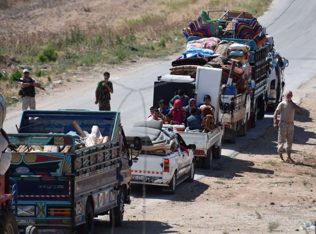 תושבים סורים מפונים מאזור דרעא. | AFP