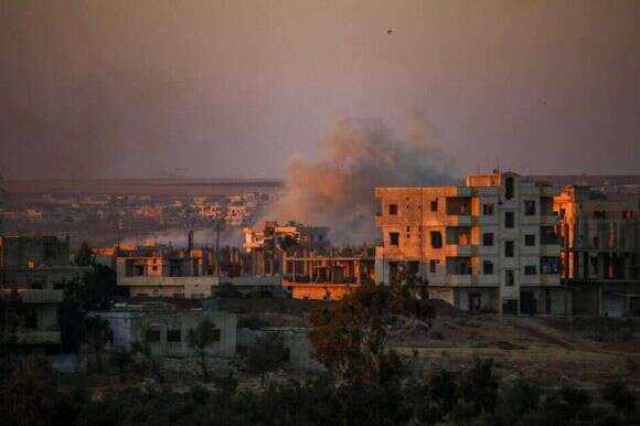 הקרבות בדרעא שבדרום סוריה בתקופת מלחמת האזרחים הסורית. | AFP הקרבות בדרעא שבדרום סוריה בתקופת מלחמת האזרחים הסורית. | AFP