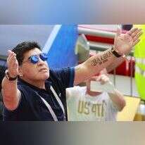 דייגו מראדונה ביציע. | EPA