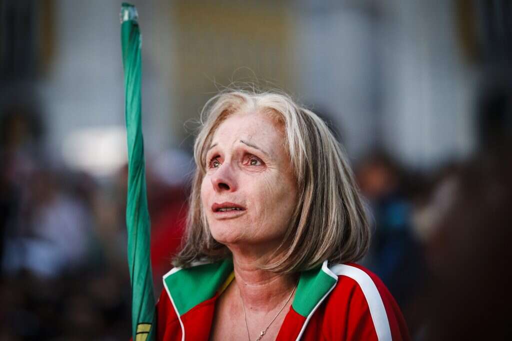 אוהדת פורטוגל עצובה. | EPA