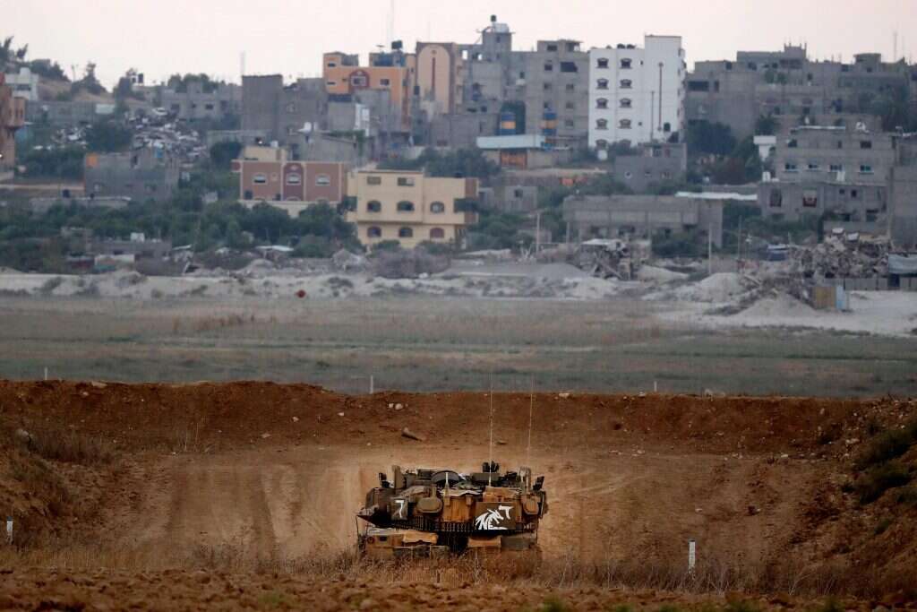 לוחמי צה''ל בגבול רצועת עזה. | AFP לוחמי צה''ל בגבול רצועת עזה. | AFP