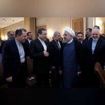 הנשיא רוחאני(במרכז) והשר זריף, השבוע. | AFP