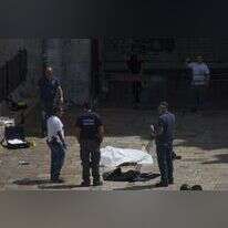 גופת מחבל שביצע פיגוע בשער שכם. | יונתן זינדל, פלאש90