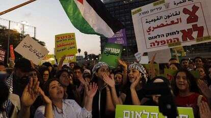 דגלי פלסטין בהפגנה נגד חוק הלאום. | AFP