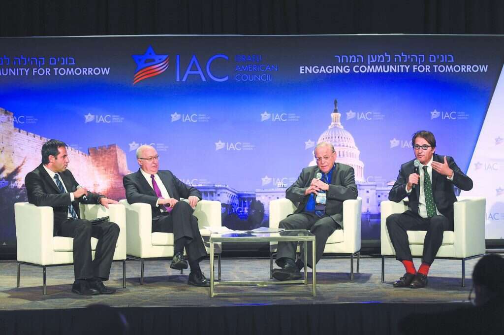 פאנל כנס IAC בוושינגטון. מימין: בועז ביסמוט, אוריאל רייכמן, מנואל טרכטנברג ואודי סגל, 2015. | שחר עזרן פאנל כנס IAC בוושינגטון. מימין: בועז ביסמוט, אוריאל רייכמן, מנואל טרכטנברג ואודי סגל, 2015. | שחר עזרן