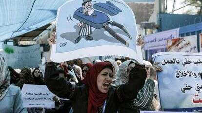 הפגנה של פלסטינים נגד הכוונה לקצץ את הסיוע לאונר''א. | AFP