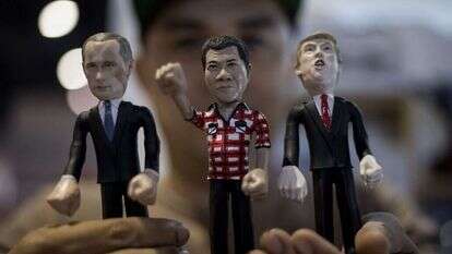 בובות של דוטרטה, פוטין וטראמפ. | AFP