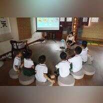 קיקו וילדי גן בביג'ינג. | AFP