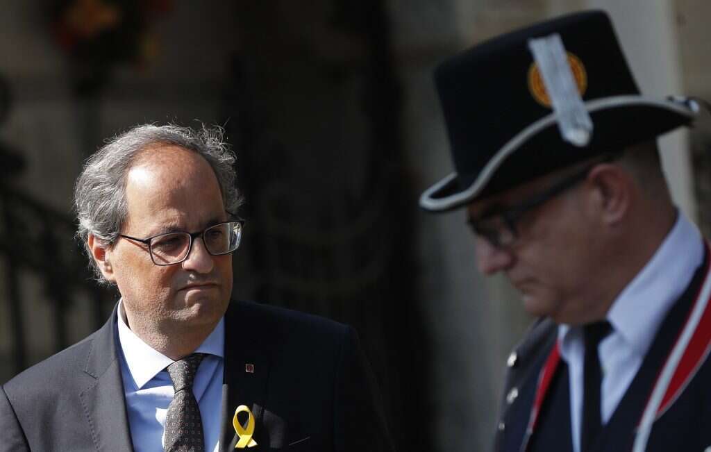 נשיא מחוז קטלוניה קים טורה. | EPA נשיא מחוז קטלוניה קים טורה. | EPA