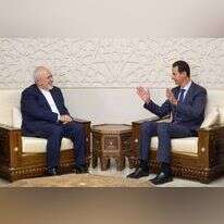 שר החוץ האיראני זריף עם נשיא סוריה אסד. | AFP