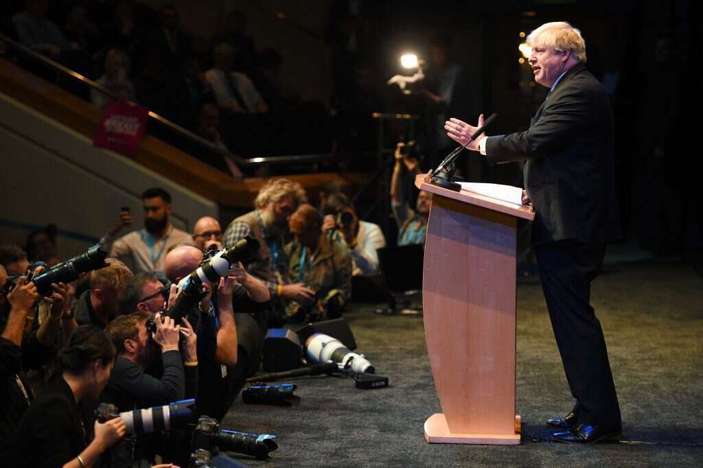 בוריס ג'ונסון נואם בוועידה השמרנית השנתית בבריטניה. | AFP