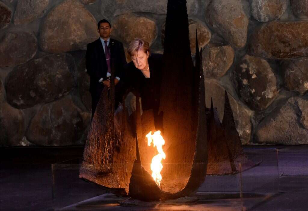 מרקל ביד ושם. | AFP