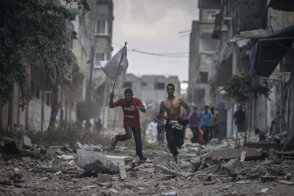 הריסות שג'אעיה אחרי מבצע "צוק איתן". | EPA הריסות שג'אעיה אחרי מבצע "צוק איתן". | EPA