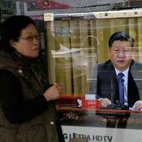 נשיא סין שי נואם בטלוויזיה, כפי שנצפה בבירת טאיוואן. | AFP