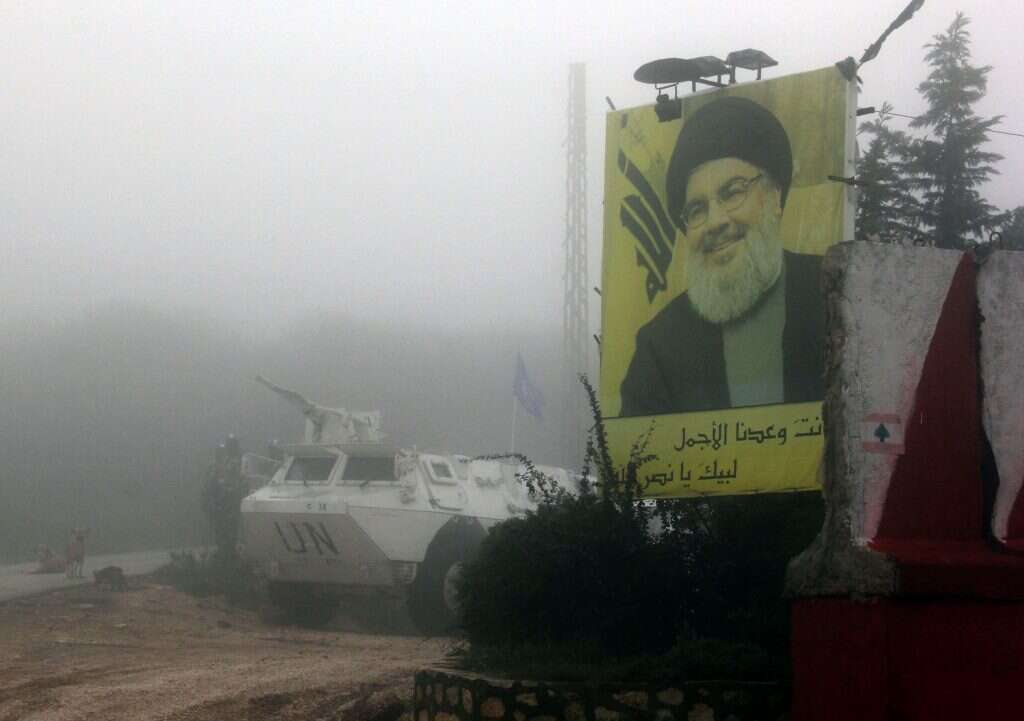 שלט תמיכה בנסראללה בגבול לבנון-ישראל. | AFP