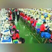 סדנת יזע במחוז שינג'יאנג, המיועדת לעובדים אויגורים. | AP