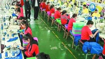 סדנת יזע במחוז שינג'יאנג, המיועדת לעובדים אויגורים. | AP סדנת יזע במחוז שינג'יאנג, המיועדת לעובדים אויגורים. | AP