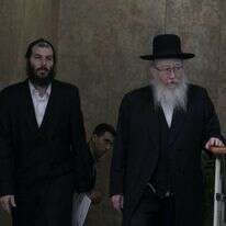 ליצמן ומקורבו מוטי בבצ'יק. | אוהד צויגנברג