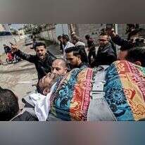 לוויתו של עבד אלחמיד אלעסכר. | AFP לוויתו של עבד אלחמיד אלעסכר. | AFP