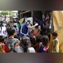 תור לקבלת חיסון בפיליפינים. | AP