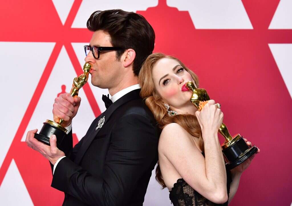 הזוכים בפרס הסרט הקצר הטוב ביותר, גיא נתיב הישראלי, ואשתו ג'יימי ריי ניומן. | AFP הזוכים בפרס הסרט הקצר הטוב ביותר, גיא נתיב הישראלי, ואשתו ג'יימי ריי ניומן. | AFP