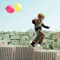 ילד בחברון, פורים 2006. | רויטרס