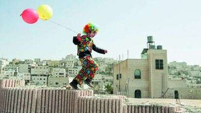 ילד בחברון, פורים 2006. | רויטרס