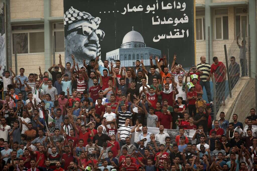 רמת המשחק לא גבוהה, אבל המגרש סוער. אצטדיון פייסל חוסייני בכפר א־ראם. | AFP