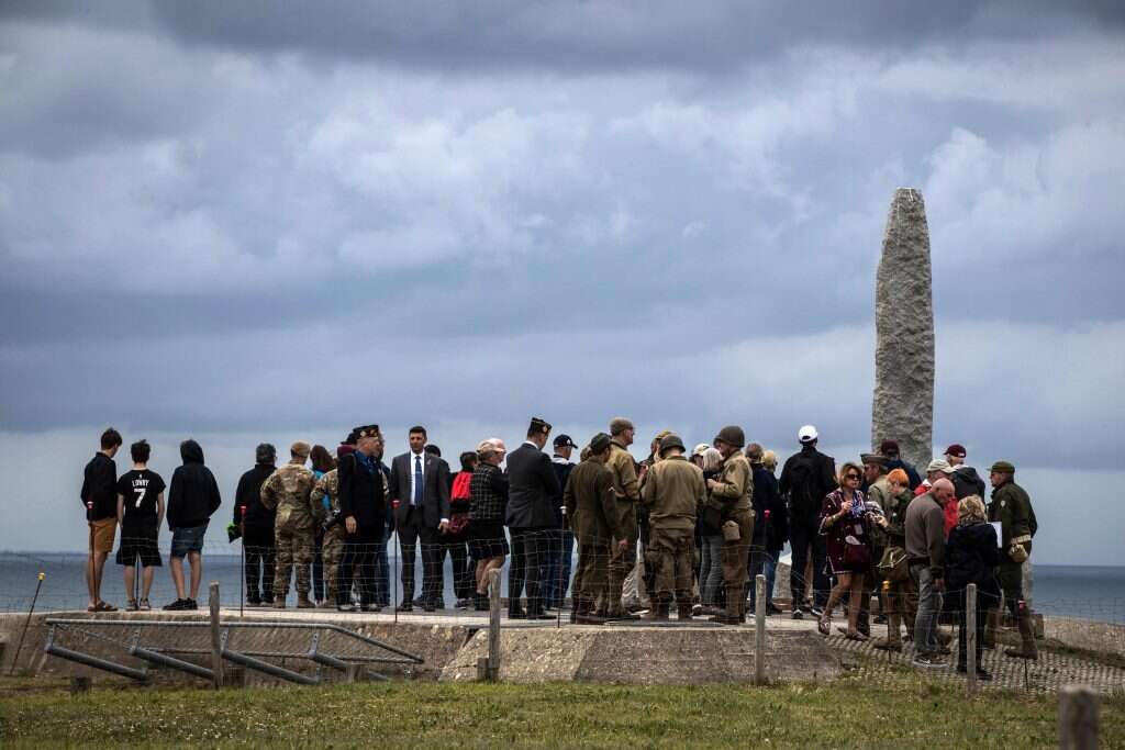 "אינספור סיפורים קבורים שיכולים לעורר שערוריה". טקס הזיכרון לקורבנות הפלישה בנורמנדי, 2019. | AFP