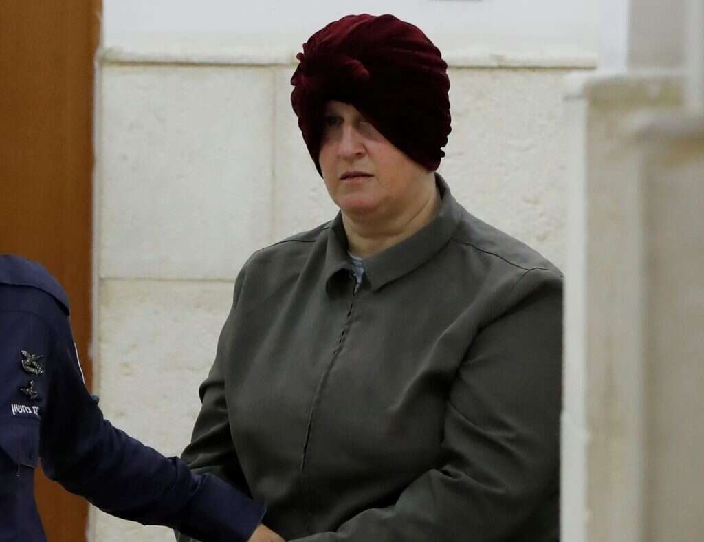 מלכה לייפר מובאת לדיון בבית המשפט המחוזי בירושלים, פברואר 2018. | AFP